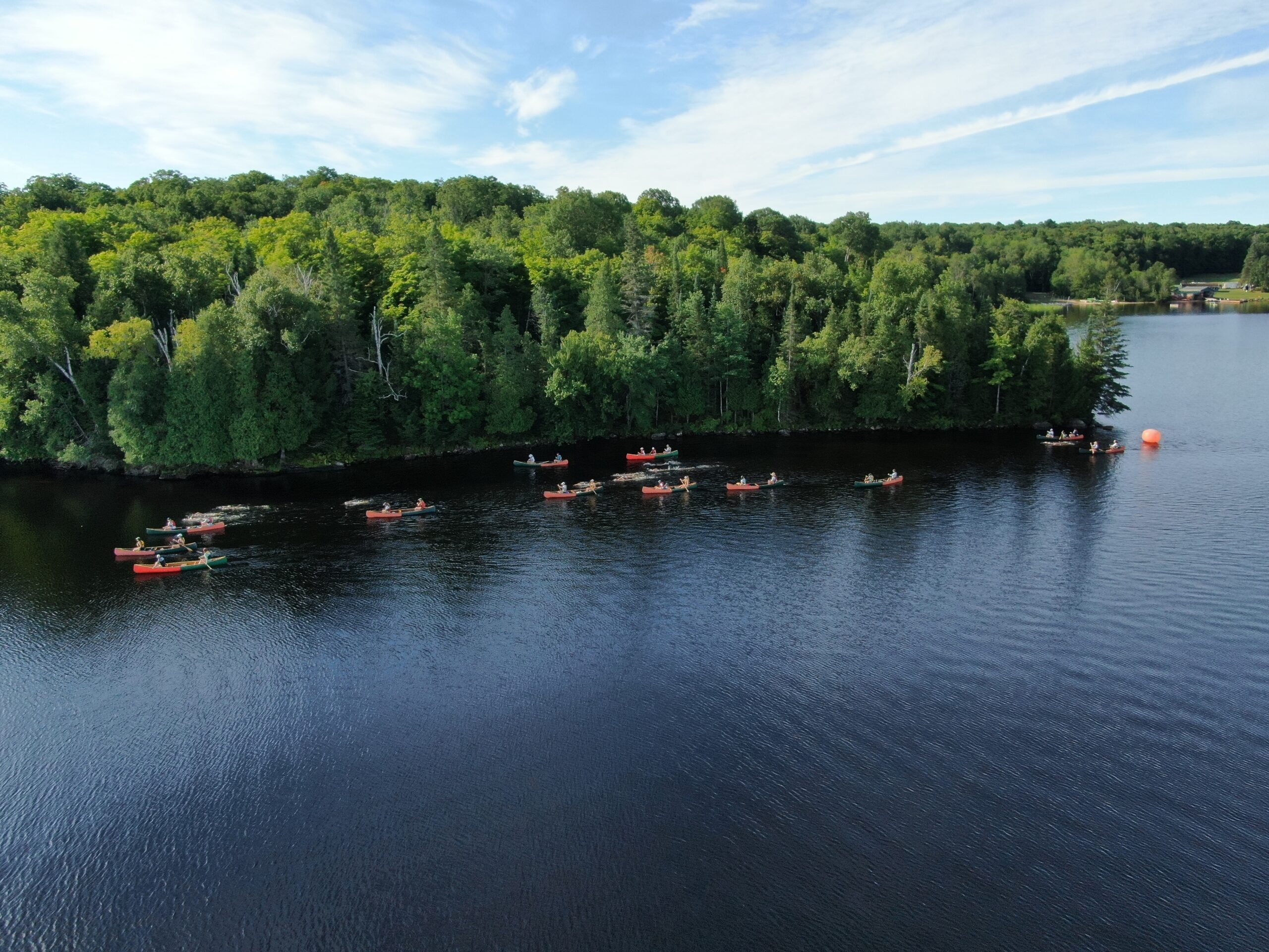 Areal view, green and orange canoes
